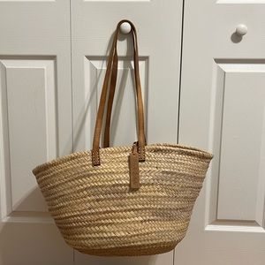 Handmade straw tote bag with leather handles and straps